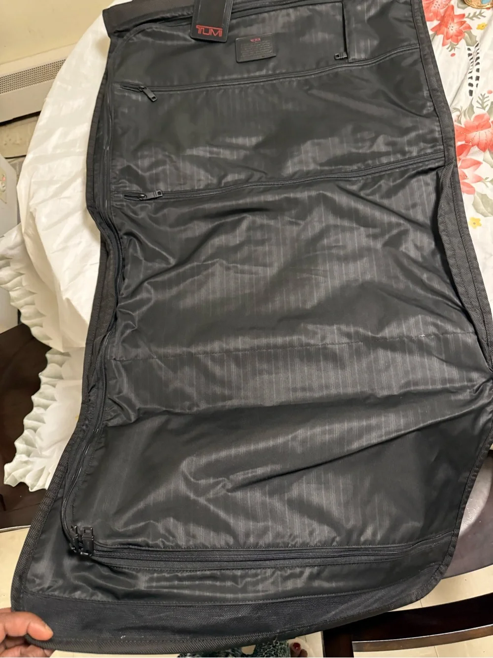 Tumi Black Roll-Top Briefcase with Red Logo Tag